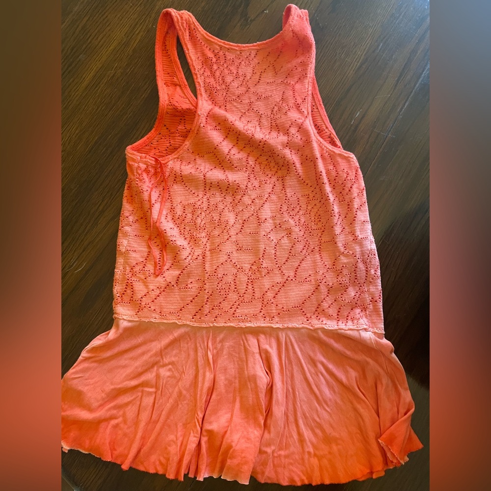 Re posh free people tank..neon orange/coral as is how it came never worn..